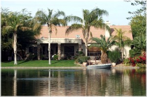 Waterfront on Ocotillo Lakes with boat